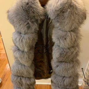 Grey leather and rabbit fur vest.